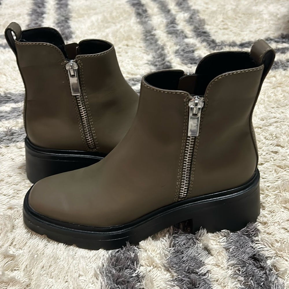 New, never worn. Dolce Vita mud green boots.